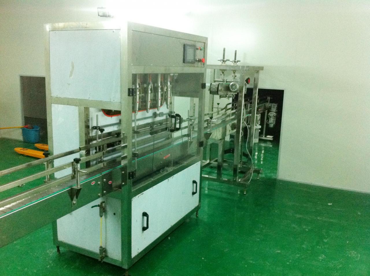 Linear filling machine with 4 filling heads MAKINË PËR MBUSHJE LINEARE.jpg