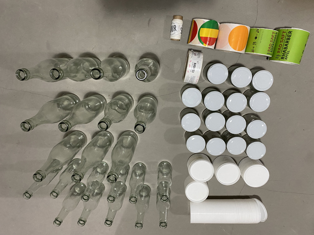 shishe rrotulla etiketa kapak mostra.JPG