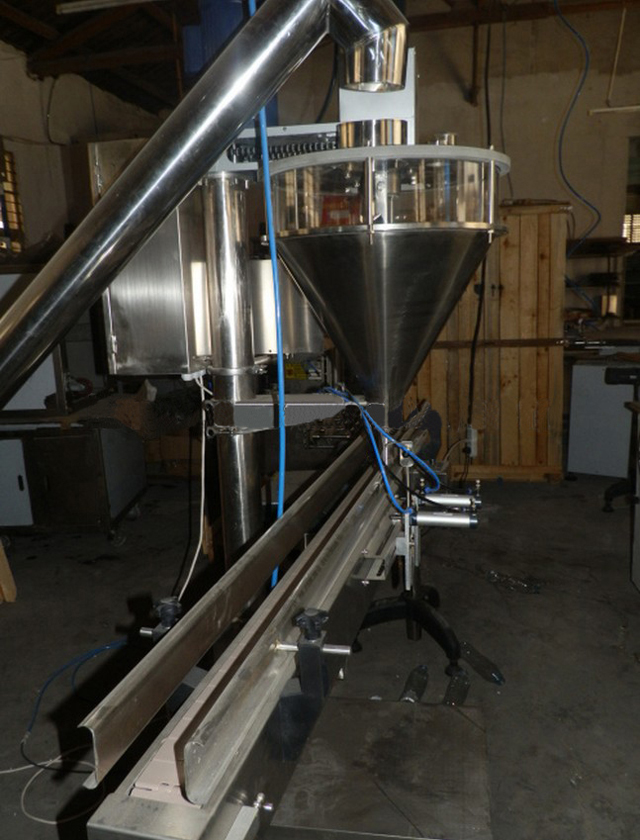 lateral shot for auger filling machine powder fabrika e miellit mbushës me pulpë.jpg