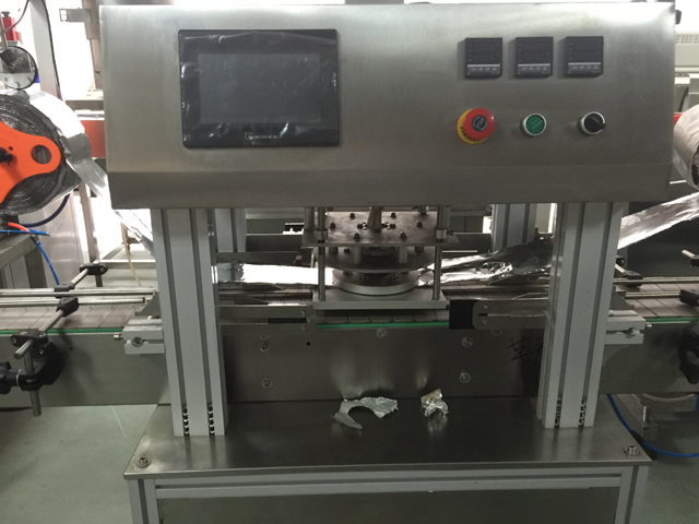 makinë vulosje e kavanozëve.jpg