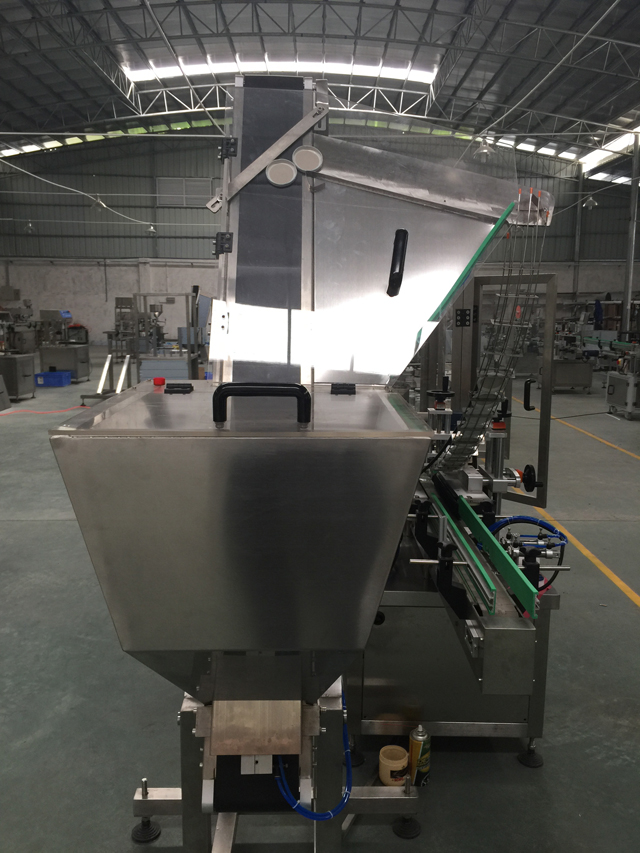 kapakë sistemi i ushqyerjes automatike.jpg