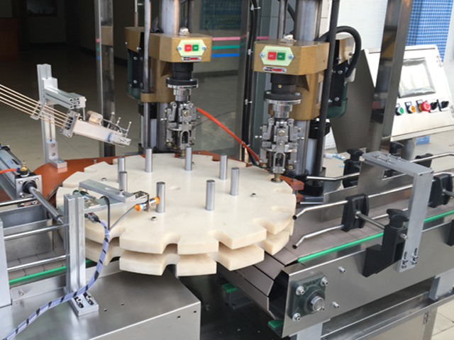 capping head kapak me vidë me dy koka.jpg