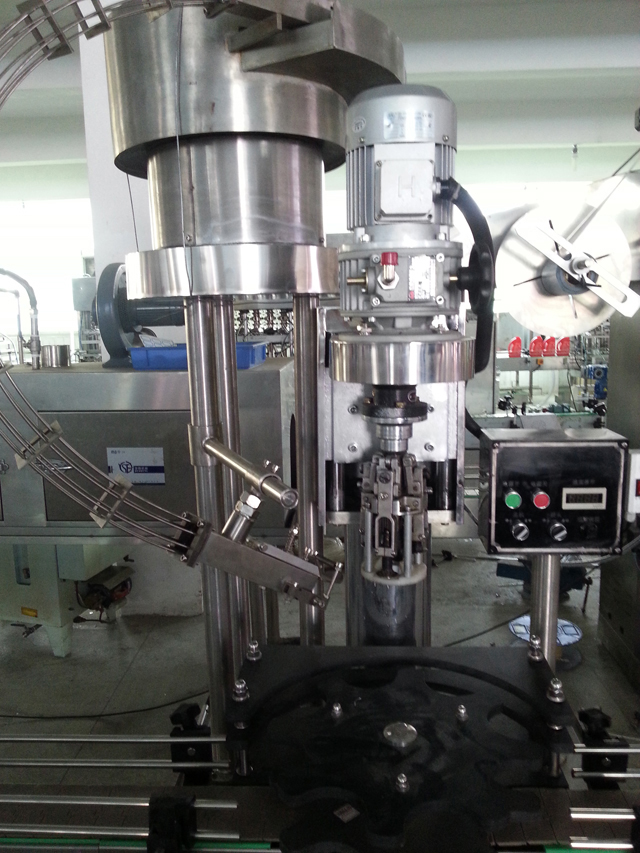 makine mbyllese per shishe.jpg