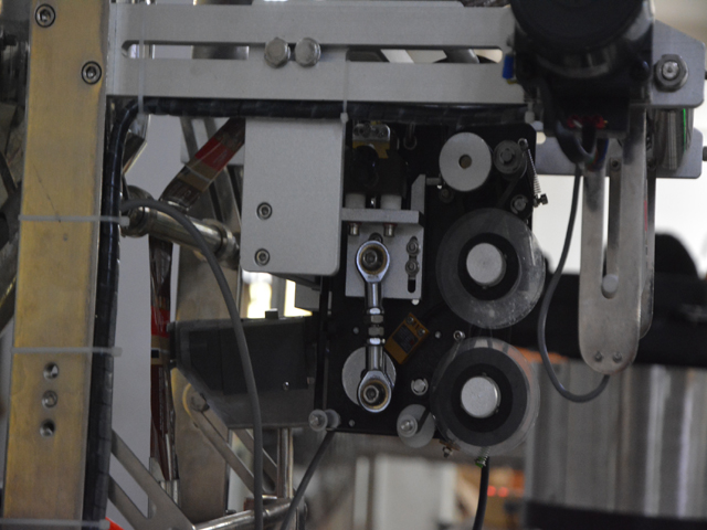 pjesë koduese e datës për mbushës të lëngshëm në thasë.jpg