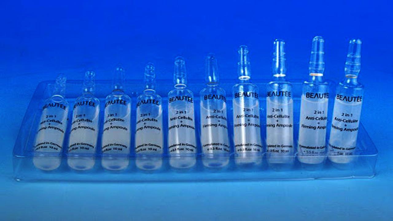 liquid solution bottles labeling machine samples final products shishe ampulash.jpg