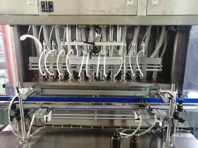 Makinë mbushëse 12 koka me ngrohës përzierës (4).jpg