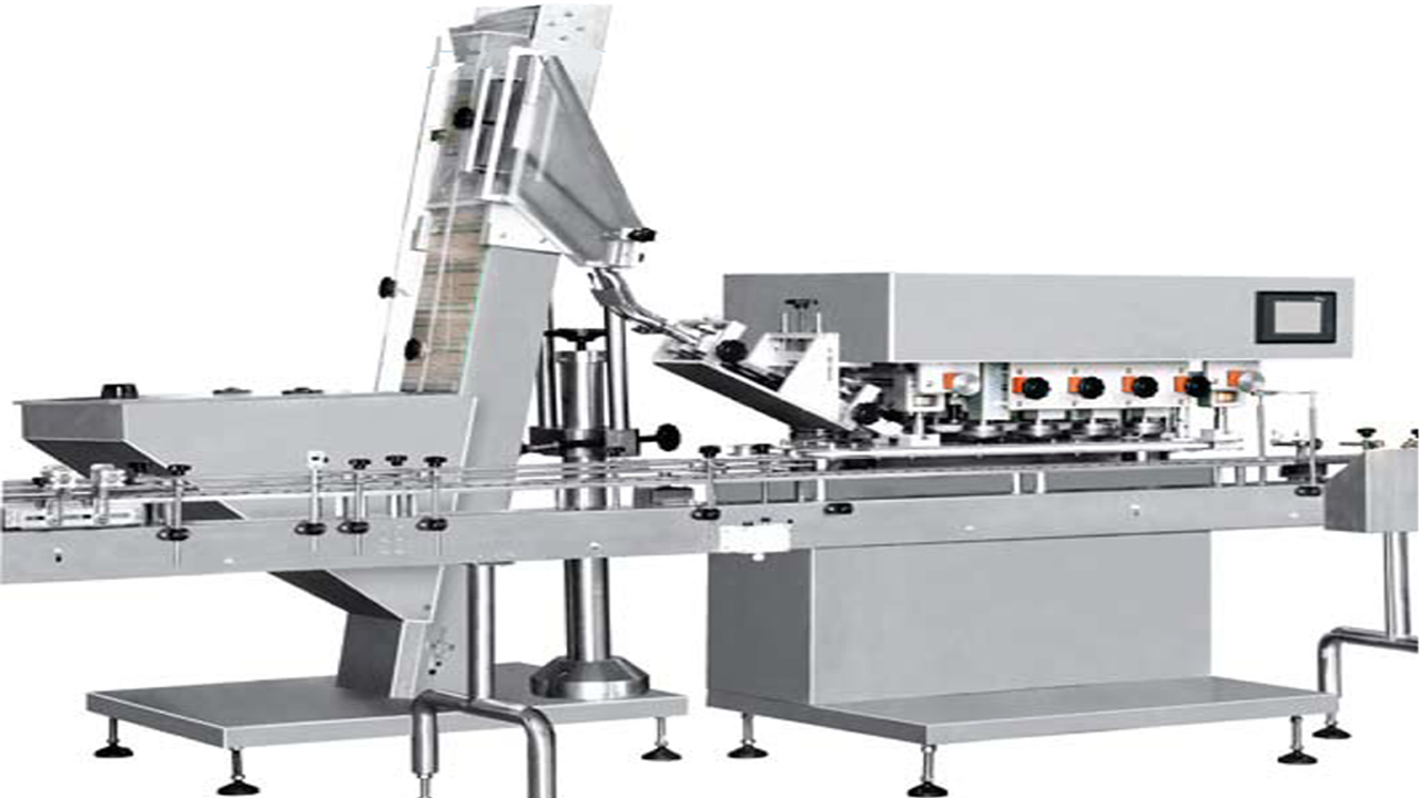 automatic linear capping machine for glass bottles Makinë për mbulim me vida me shpejtësi të lartë.png