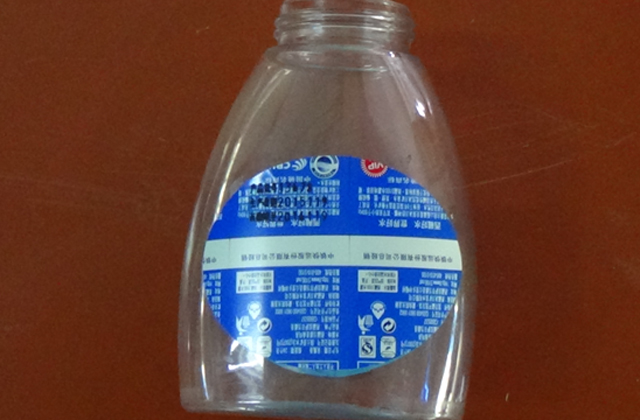 makinë etiketimi rrotulluese për mostra të shisheve të sheshta.jpg